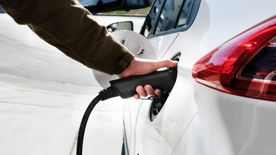 EV charging white car