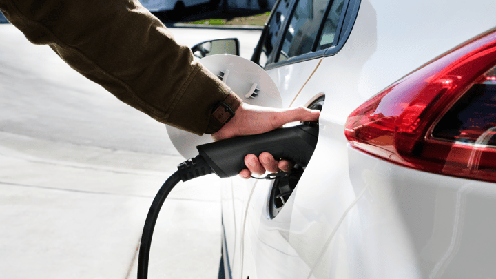EV charging white car