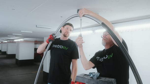 electricians installing conduit